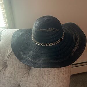 Elegant Black Wide-Brim Hat with Gold Chain